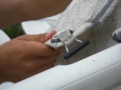 Large grommet at the clew of the main sail