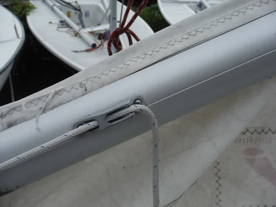 Outhaul secured in the jam cleat on the boom