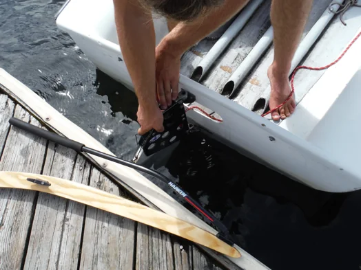 Sailor lowering the rudder onto the FJ pins