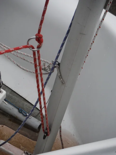 Main halyard passed through the metal ring