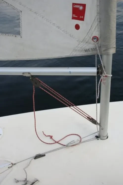 Laser downhaul lines and bowline at the base of the mast.